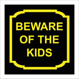 HU399 Beware Of The Kids Black Background Yellow Text