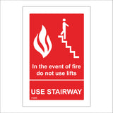 FI095 In The Event Of Fire Doe Not Use Lifts Use Stairway Sign with Flames Person Stairs