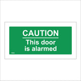 FS244 CautionThis Door Is Alarmed Sign