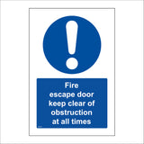 MA523 Fire Escape Door Keep Clear of Obstruction At All Times Sign with Circle Exclamation Mark