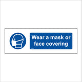 MA668 Wear A Mask Or Face Covering Sign with Mask Face