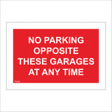 TR299 No Parking Opposite These Garages At Any Time Sign