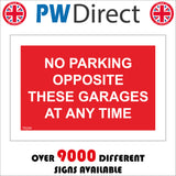 TR299 No Parking Opposite These Garages At Any Time Sign