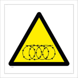 WT346 Razor Wire Black Coil Wire Symbol Yellow Background