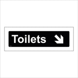 GG392 Toilets Down Arrow White On Black Plaque