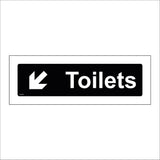 GG395 Toilets Left Down Arrow White On Black Plaque