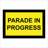 TR777 Parade In Progress Yellow Background Black Text Border