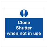 MA733 Close Shutter When Not In Use Sign with Circle Exclamation Mark