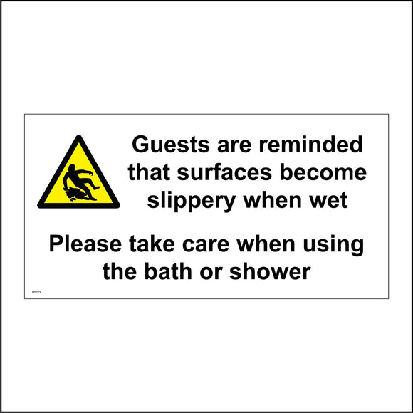 WS775 Guests Are Reminded That Surfaces Become Slippery When Wet Please Take Care When Using The Bath Or Shower Sign with Triangle Person Slipping