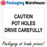 TR279 Caution Pot Holes Drive Carefully Sign