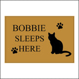 CM143 Pet Name Sleeps Here Sign with Cat Paw Print